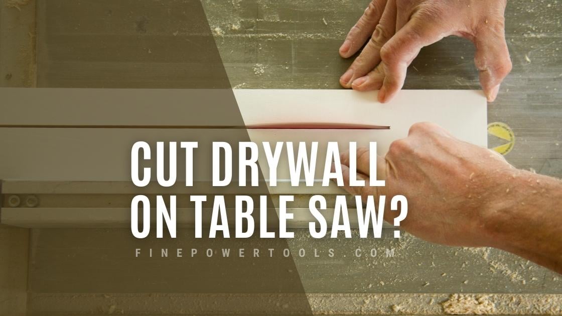 Man cutting drywall on table saw